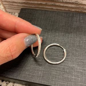 Silver hoops with clear channel set stones